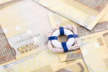 The lifebuoy is on the euro note