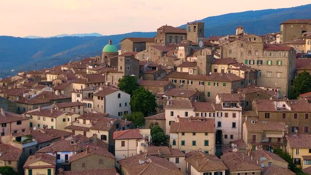 Cortona Italian medieval mountain village Tuscany. Fantastic aerial top view flight panorama orbit drone
4k cinematic footage