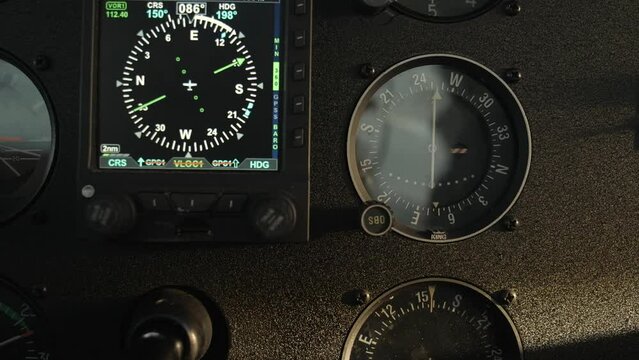 Close Up Airplane Navigation Instruments - Digital HSI during Turn