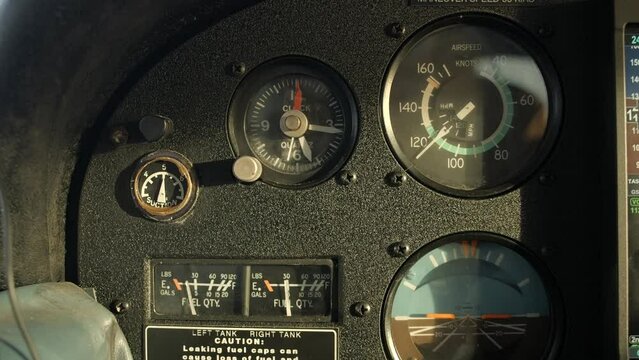 Old Fashioned Airplane Instrument Panel in Small Aircraft Cockpit CU