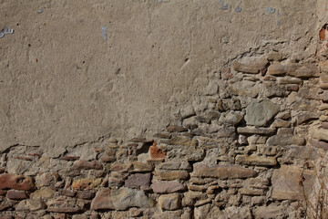 old damaged stone wall