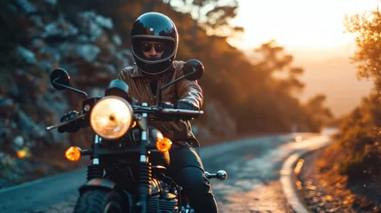 Zelfklevend Fotobehang A man wearing a helmet and riding a motorcycle © sirisakboakaew