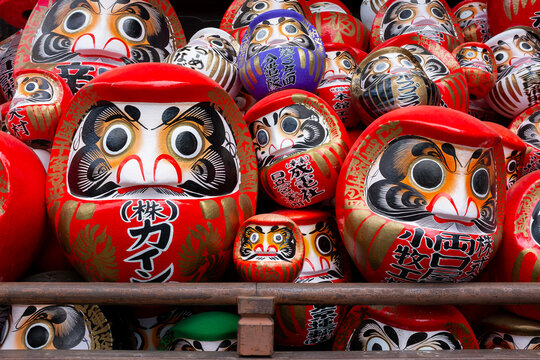 A stockpile of traditional Japanese daruma dolls at Shorinzan Daruma-ji Temple in Gunma Prefecture in Japan