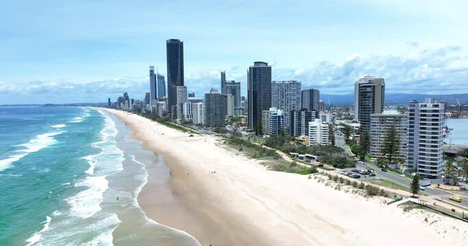The iconic Gold Coast beach front, luxury apartments looking out over  the golden sands of Sufers Paradise, Queensland, Australia
