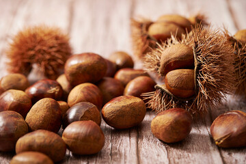 chestnuts on a wooden background	