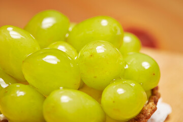 Green grape tart on a plate