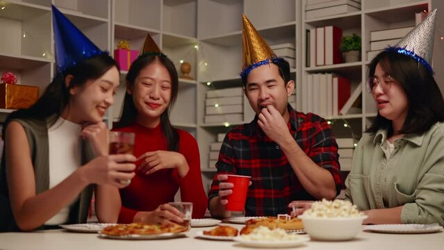 Friends join and celebrate the party with eating foods and drinks. Happy and joyful in holiday weekend and festival.