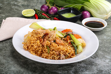 Asian cuisine - Fried noodles with seafood