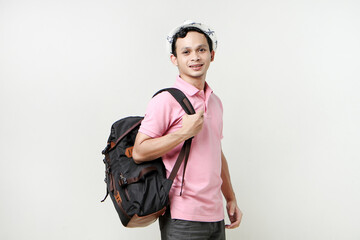 Asian man backpacker portrait. digital nomad and travelling concept. on isolated background