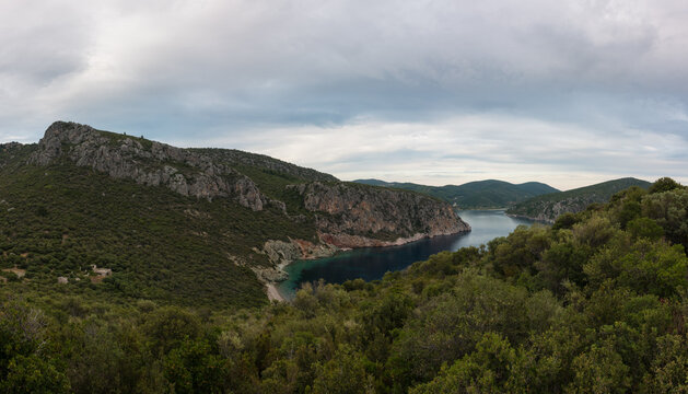 Stunning view to the sea from the hills around Toroni village, Chalkidiki, Greece, under a cloudy sky in autumn
