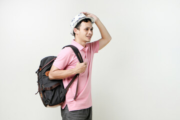 Asian man backpacker portrait. digital nomad and travelling concept. on isolated background