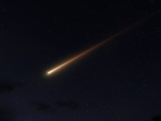 Burning meteorite in the atmosphere. Fireball at night isolated. A falling star lights up the sky.