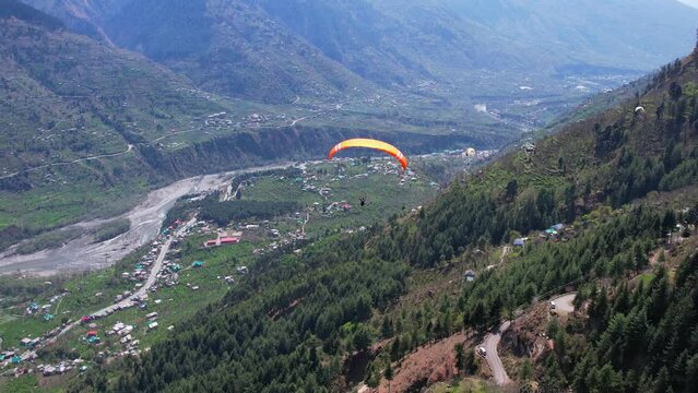 ITS A ARIEAL DRONE SHOTS OF ICE MOUNTAION AND ANOTHER MOUNTAION IN MANALI,INDIA