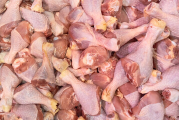 Raw chicken drumsticks background