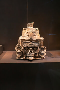 Abu Dhabi, United Arab Emirates, November 18th 2023: The Louvre Museum of Abu Dhabi. An artefact representing a face from South America