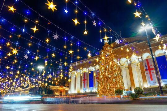 Tbilisi, Georgia - 15, December: Christmas tree in front of the Parliament of Georgia with illumination on the city street