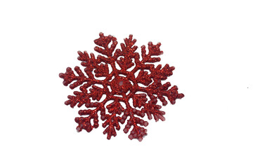 A red snowflake on a white background. Attribut of Christmas and New Year holidays. The set for the...