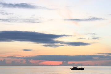 boat over sunrise