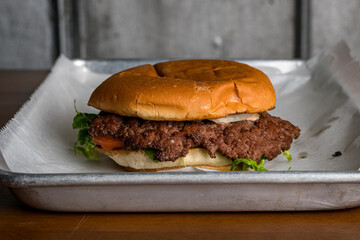 Hamburger with lettuce and tomato