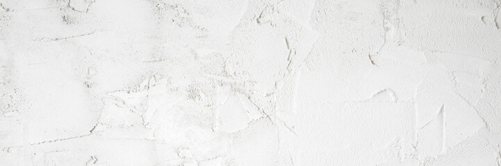Light gray dry putty ceiling, wall or floor background. Closeup. Wide banner. Empty place for text.