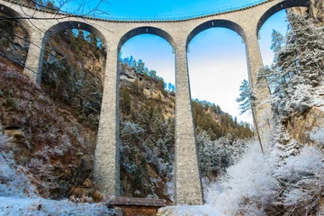 Foto auf Acrylglas Landwasserviadukt View of Landwasser Viaduct, Rhaetian railway, Graubunden in Switzerland at winter