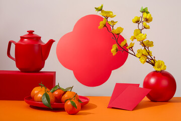 Lunar New Year festival concept with some items in red color. Apricot blossoms decorated. Lunar New...