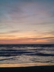 Fototapeta premium Amazing sunset over sea in Golden Bay Malta.