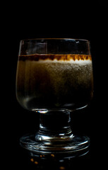 Coffee cocktail on black background