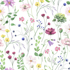 Seamless floral pattern with delicate colorful wildflowers and green branches, isolated watercolor...