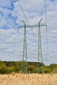 Landscape with pylons of 400 kV power transmission line of the Czech transmission system.