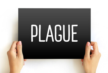 Plague is an infectious disease caused by the bacterium Yersinia pestis, text concept on card