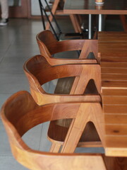 Fototapeta na wymiar wood chair and wood table at the restaurant