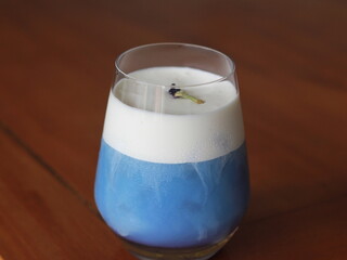 blueberry ocean drink on the table, drink with the blueberry and cream taste