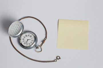 Vintage pocket watch on white background