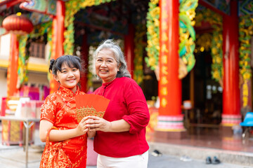 Chinese lunar new year festival and tradition holiday celebration concept. Happy Asian family...