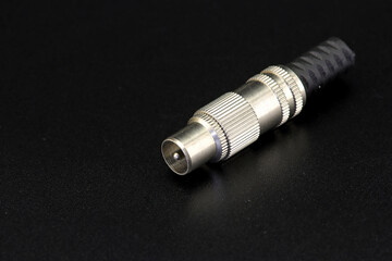 Connector for connecting a coaxial cable for transmitting a television signal.