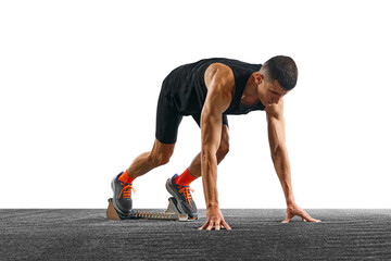 Young athletic man, professional jogger preparing to run while standing at low start against white pristine background. Concept of sport, active lifestyle, action. Copy space for text. Ad