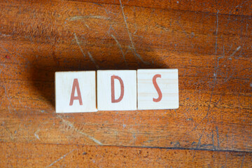 Obraz premium Photo of words with wooden block objects arranged into the word 