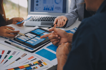 Close up ux developer and ui designer use augmented reality brainstorming about mobile app interface wireframe design on desk at modern office.Creative digital development agency