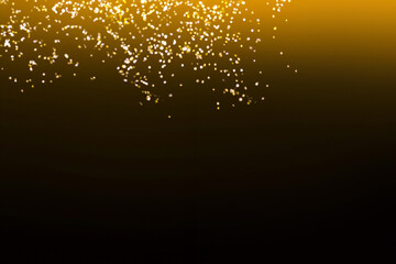 Abstract background. Golden rays of light with luminous magical dust. Glow in the dark. Flying...