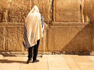 Naklejka premium Jew praying near the Western Wall in Jerusalem