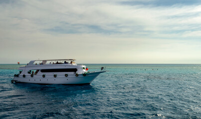 tourists on white boats in the Red Sea Egypt