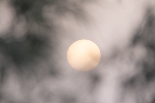 Sunset on sky pastel coloured background, big sun golden color on dusk twilight evening wallpaper, beautiful abstract scene summer during calima on the Canary Islands