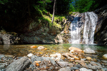 Hiking to the Kuenser Waterfalls near Meran in South Tyrol Italy.  - obrazy, fototapety, plakaty