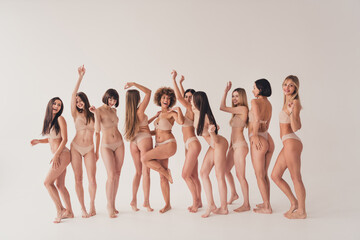 Studio no retouch photo of slender adorable ladies dressed lingerie enjoying all beautiful bodies...