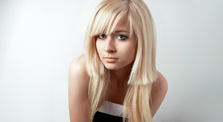 Fototapeta premium Beautiful Blonde woman with Long Blond Hair.