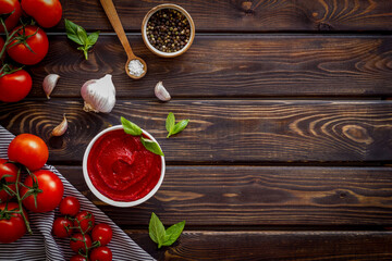Italian tomato sauce for pasta - passata with tomatoes and basil