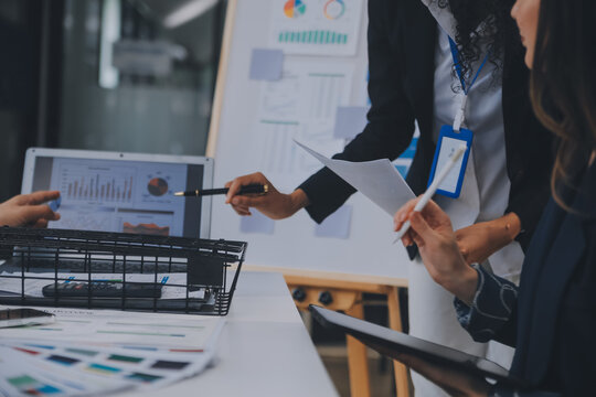 Close up ux developer and ui designer use augmented reality brainstorming about mobile app interface wireframe design on desk at modern office.Creative digital development agency