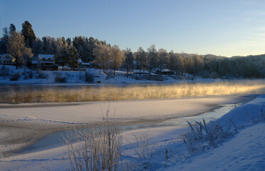 Honefoss River in Winter with steam rising, Honefoss, Viken, Norway