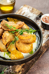 Ukrainian dish varenyky, vareniki, pierogi, pyrohy. dumplings. top view. place for text